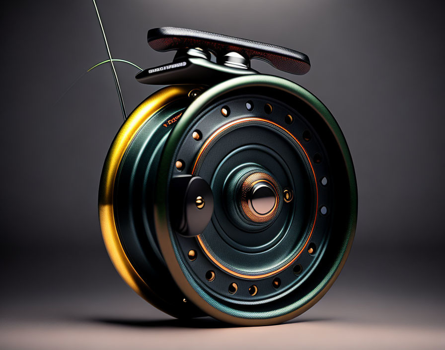 Modern Gold and Black Fly Fishing Reel on Grey Background