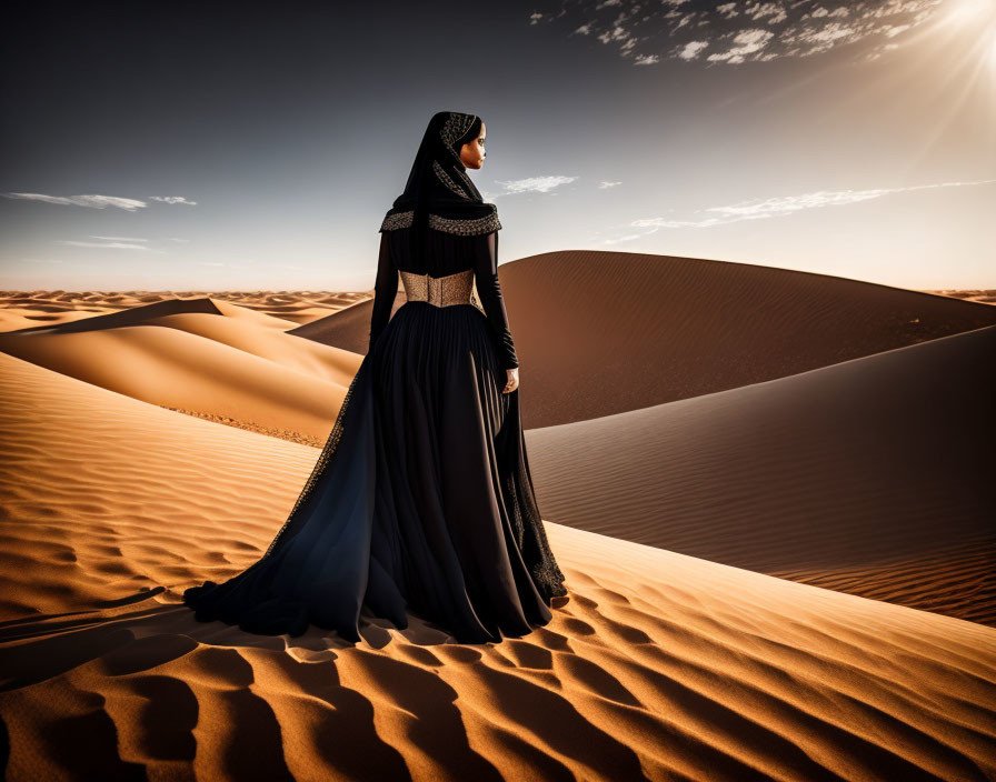 Person in flowing black dress on desert dune under warm sun glow