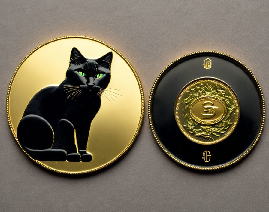 Decorative gold and black coins with cat silhouette and ornate designs.