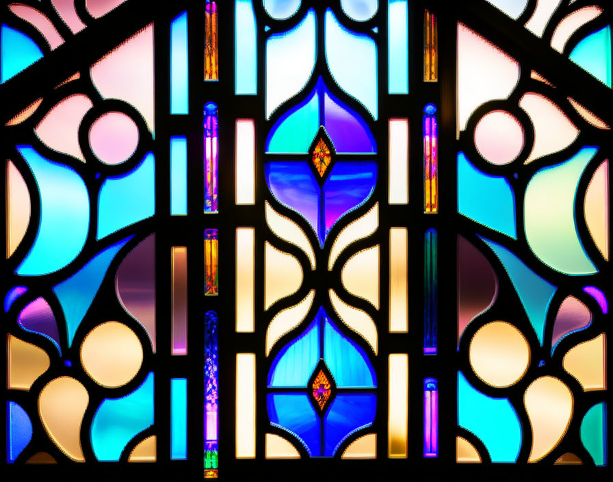 Colorful Geometric Stained Glass Window in Blue, Purple, Yellow, and Pink