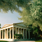 Classical-style Pavilion with Columns in Lush Green Setting