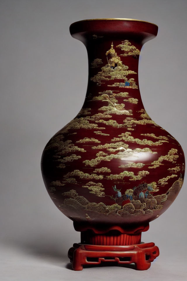 Traditional Chinese Red Vase with Gold-Painted Clouds and Landscape Design