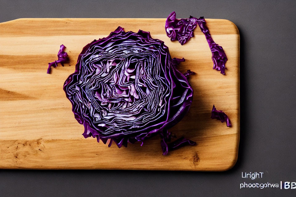 Purple Cabbage Cross-Section on Wooden Cutting Board