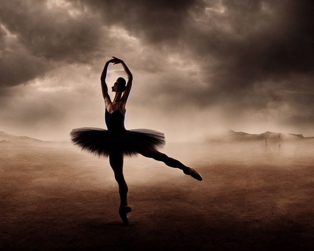 Silhouetted ballerina in black tutu against dramatic sky