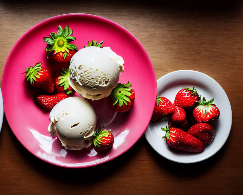 Vanilla Ice Cream Scoops with Fresh Strawberries on Pink Plate