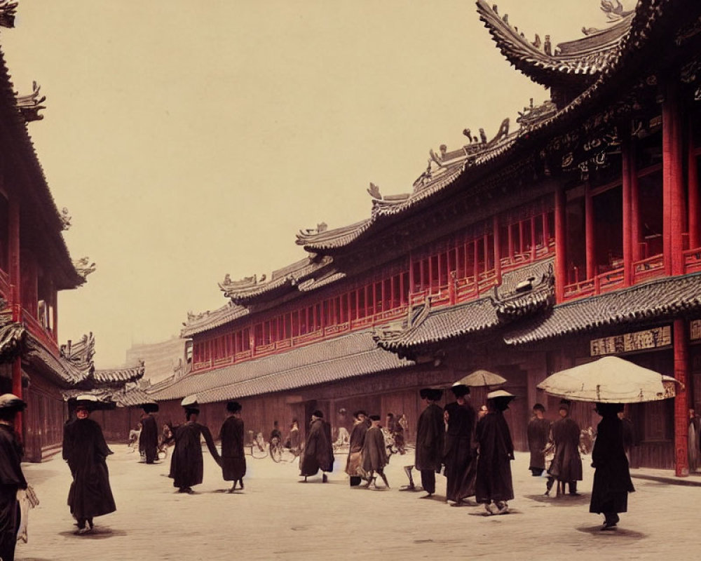 Historical photo of individuals in traditional attire near ornate buildings in East Asia