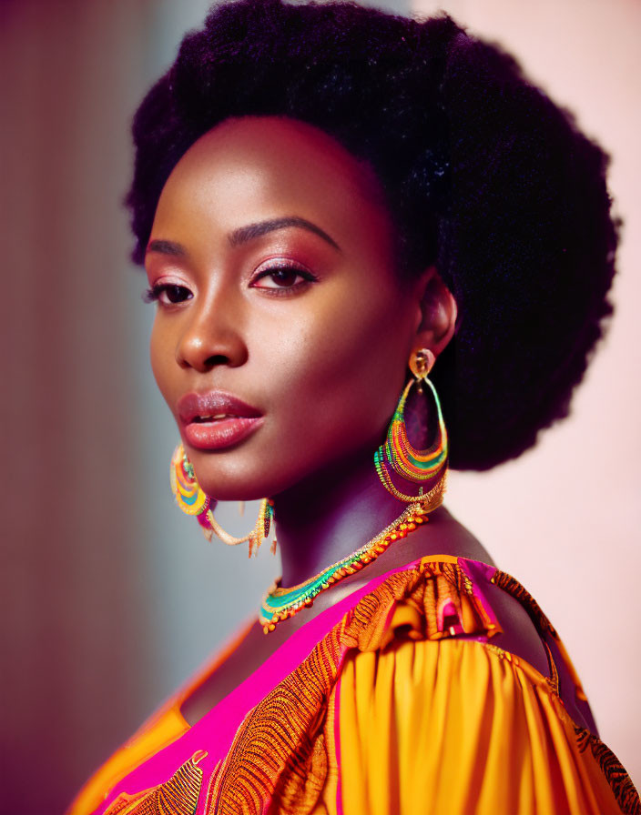 Colorful Afro Woman Portrait with Hoop Earrings on Pink Background