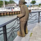 Vintage Naval Officer Stands on Ship Railing Amid Tall Ships