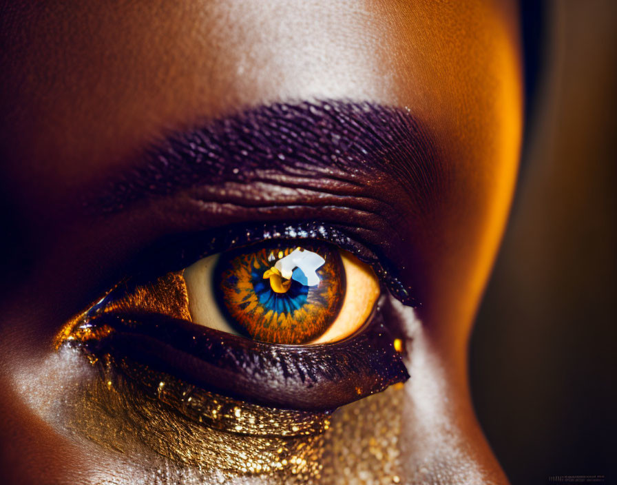 Close-Up of Eye with Golden and Purple Makeup and Reflected White Flower