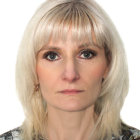 Blonde Woman Portrait with Hazel Eyes and Floral Attire