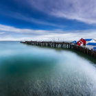 Colorful houses on wooden pier in serene seascape