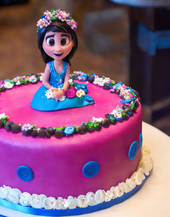 Colorful Fondant Cake with Girl Figure in Blue Dress and Floral Crown