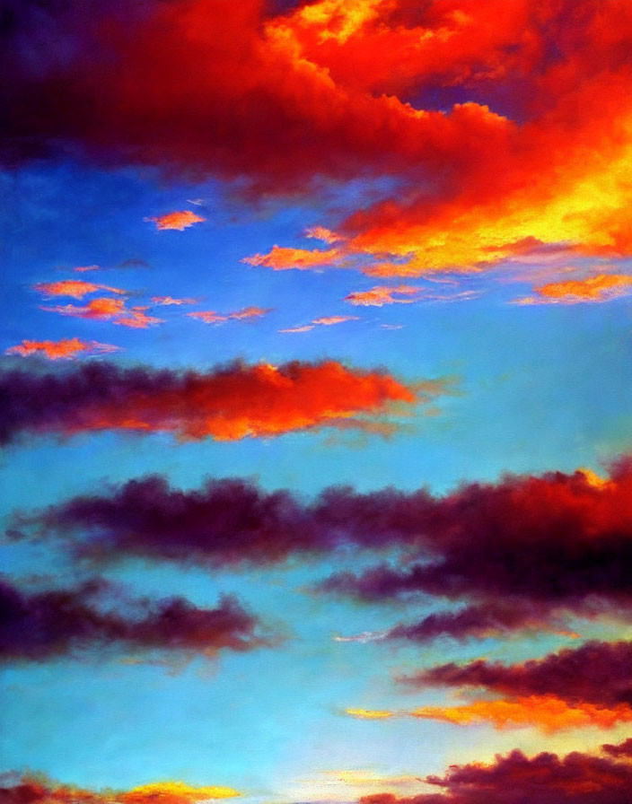 Colorful sunset with orange and purple clouds on blue sky