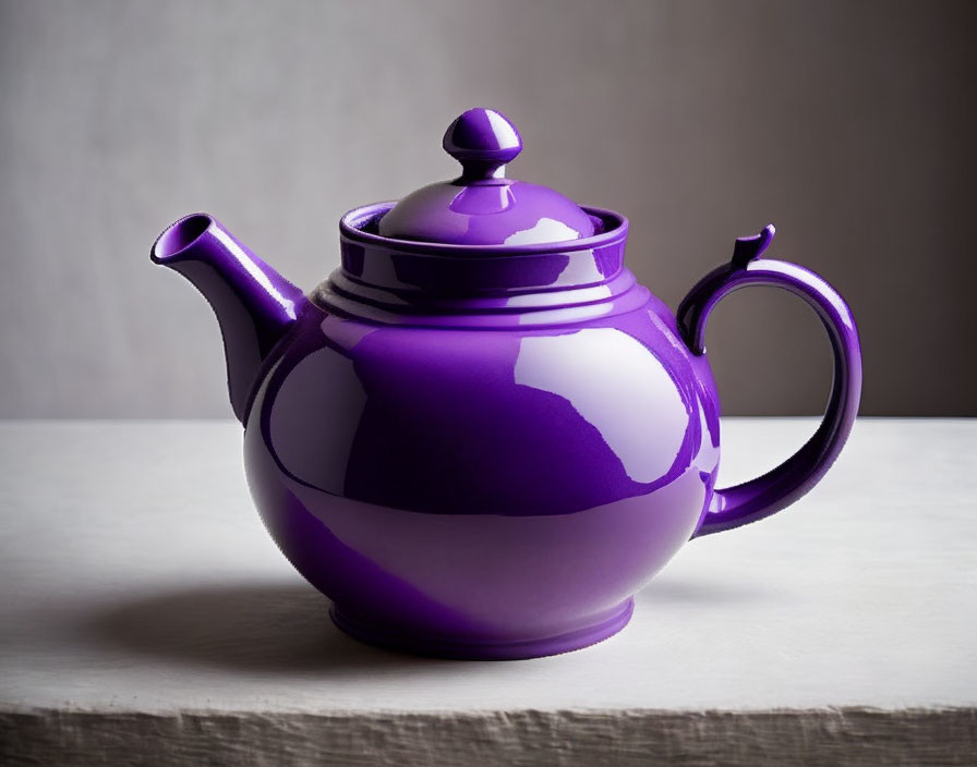 Purple Glossy Teapot on Neutral Background with Curved Handle and Spout