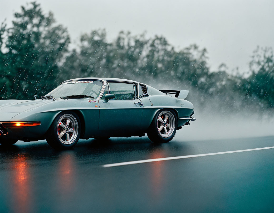 Vintage sports car in rain with moody sky