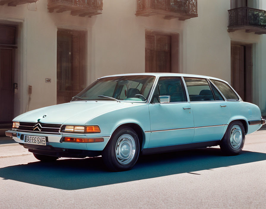 Classic Light Blue Citroën Car on Sunny Street with Buildings