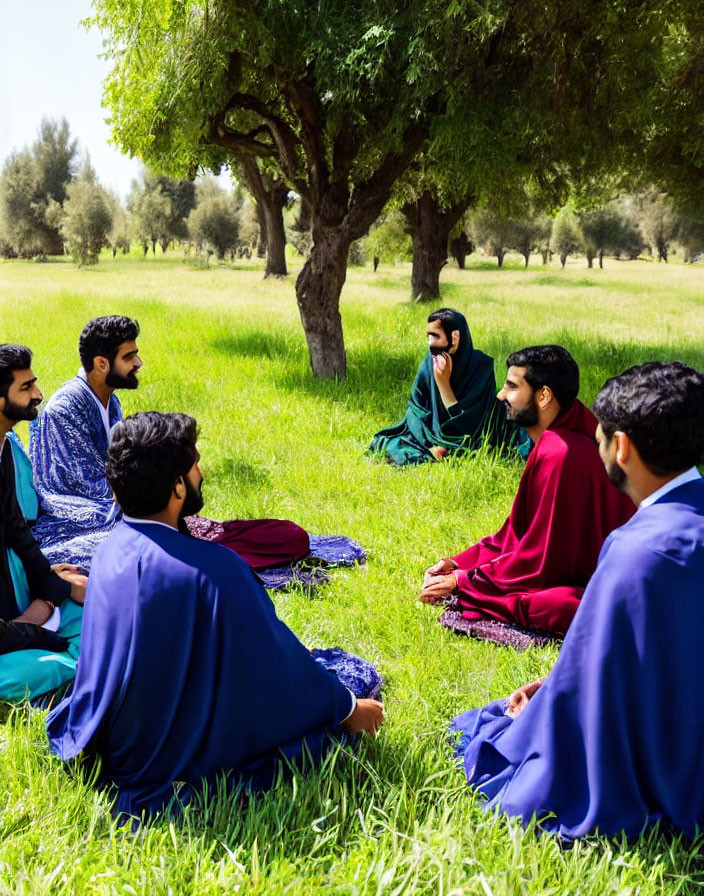 Traditional Attire Group Conversation in Park