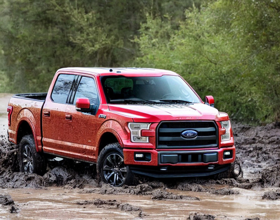 Red Ford F-150 Pickup Truck Off-Roading in Mud
