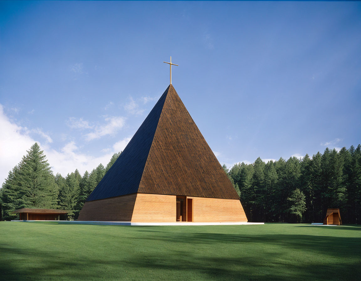 Triangle-shaped Church with Cross in Forest Clear Sky