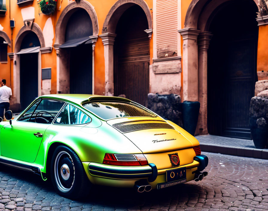 Bright Green Porsche 911 Targa on Cobblestone Street with Orange Arches