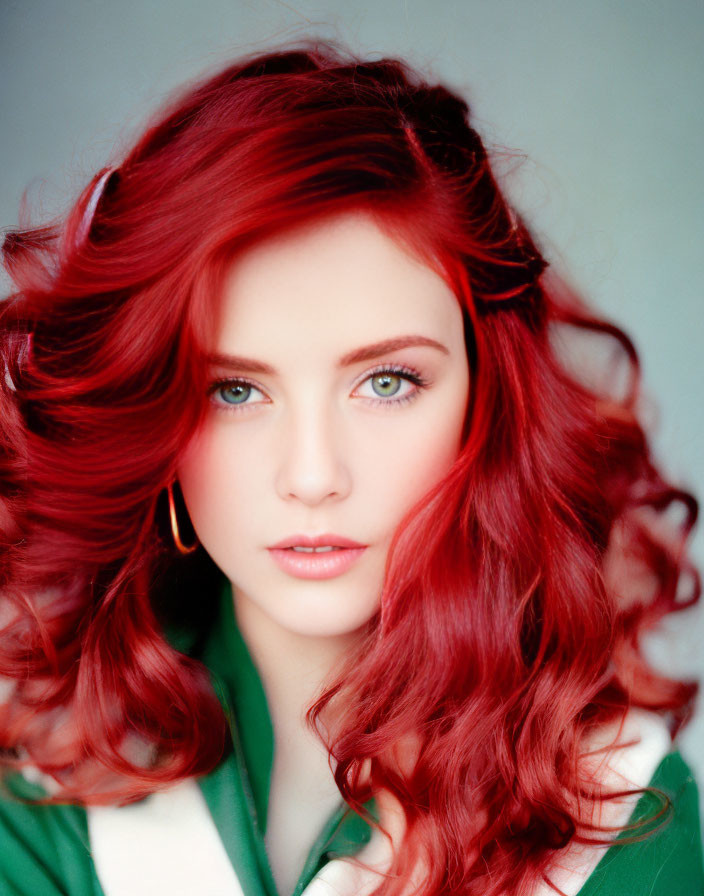 Woman with Red Hair and Green Eyes in Hoop Earrings and Jacket