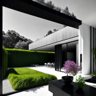 Monochrome palette modern house with large windows and lush garden