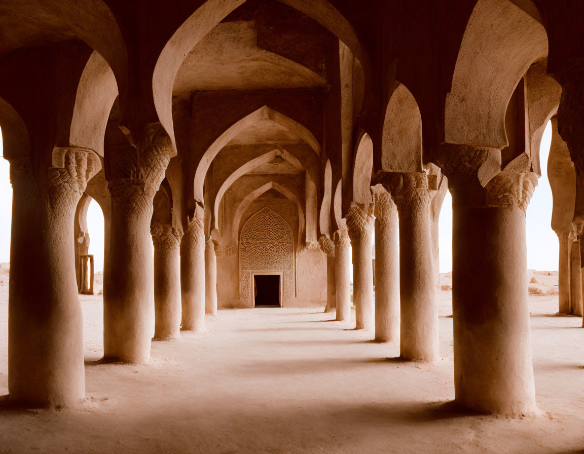 Ancient building interior with arched columns and vaulted ceiling showcasing traditional architecture and ornate carv