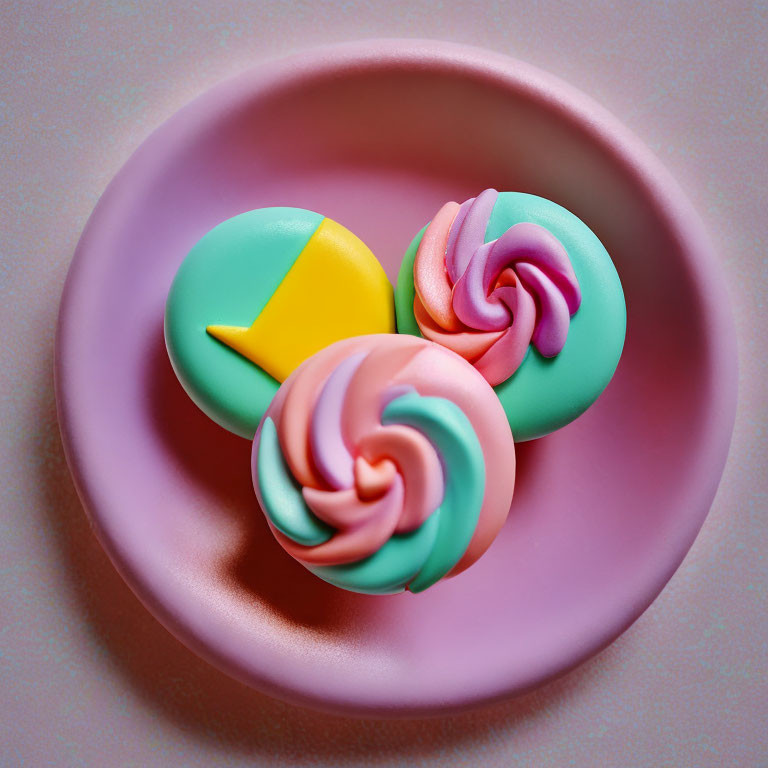 Colorful Swirled Meringue Cookies on Pink Plate