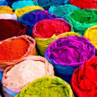 Colorful Powders in Blue, Red, Yellow & Green Sacks at Market