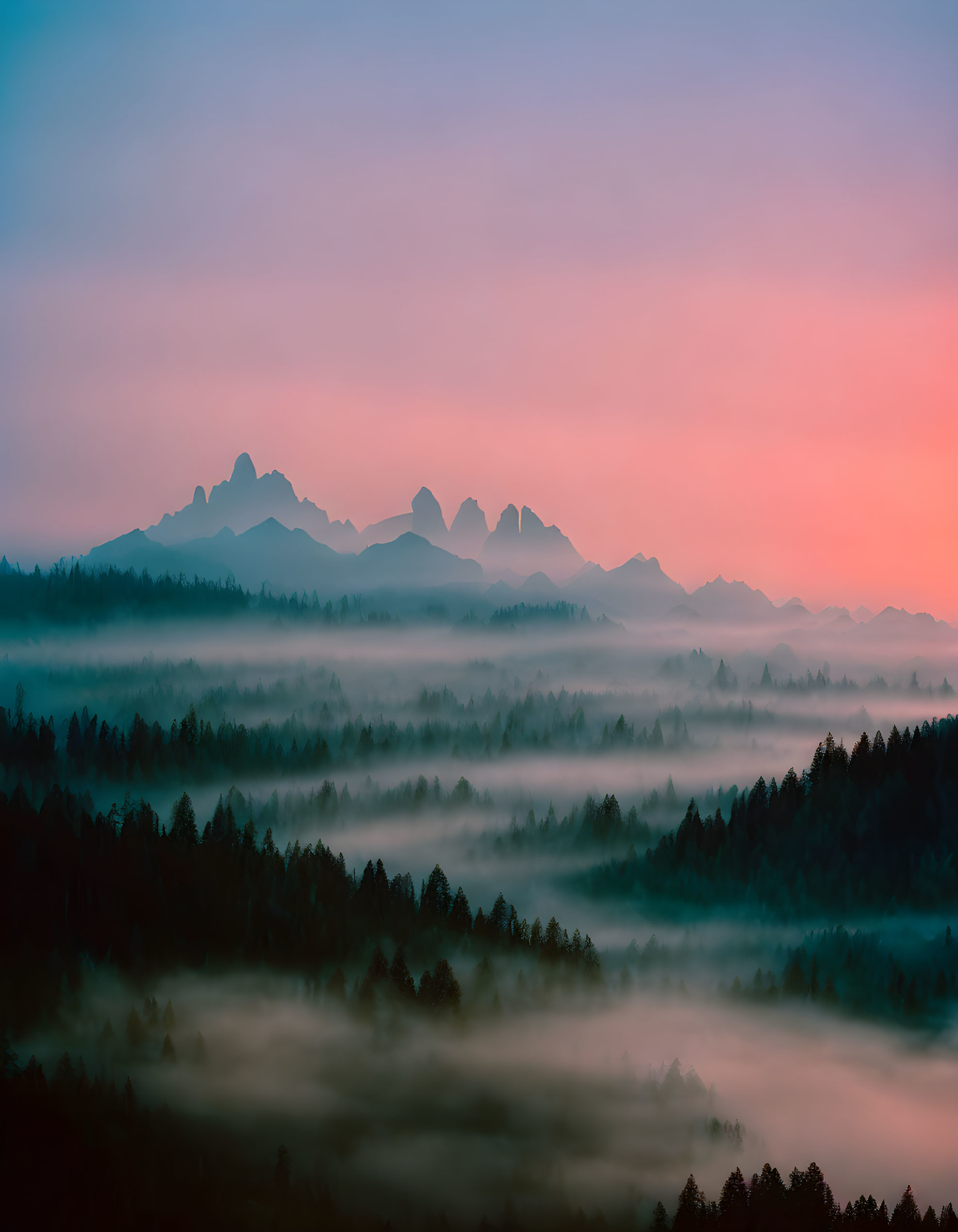 Layered Mountain Silhouettes in Misty Forest Dawn Landscape