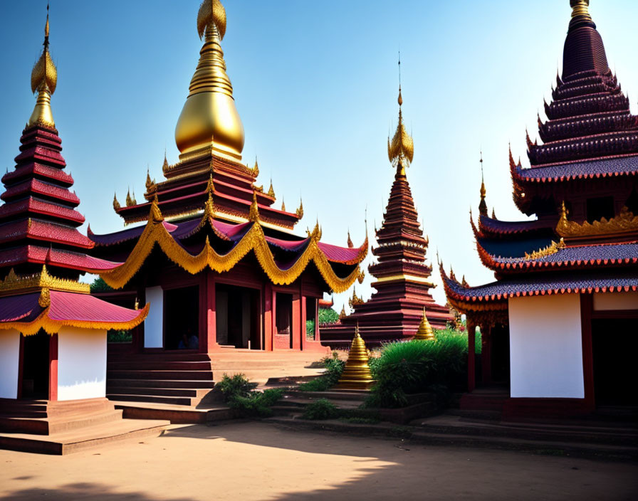 Burmese Pagodas with Gold and Red Tiered Roofs