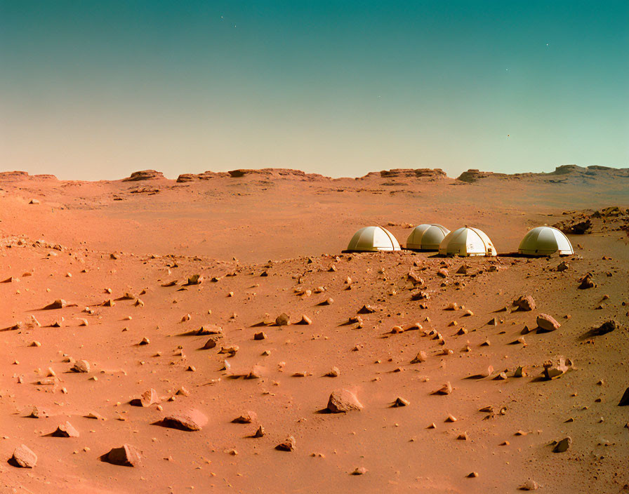 Domed habitats on rocky Martian-like desert surface