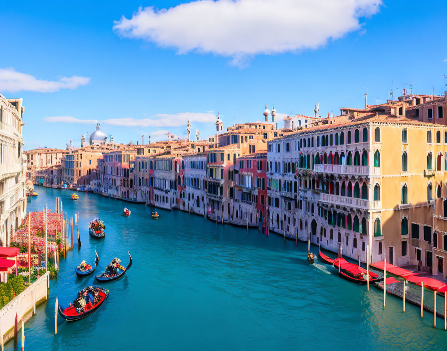 Scenic Grand Canal view in Venice with colorful buildings and gondolas