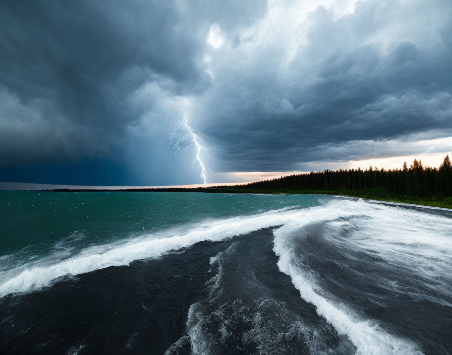 Dramatic thunderstorm with lightning over choppy lake and forest