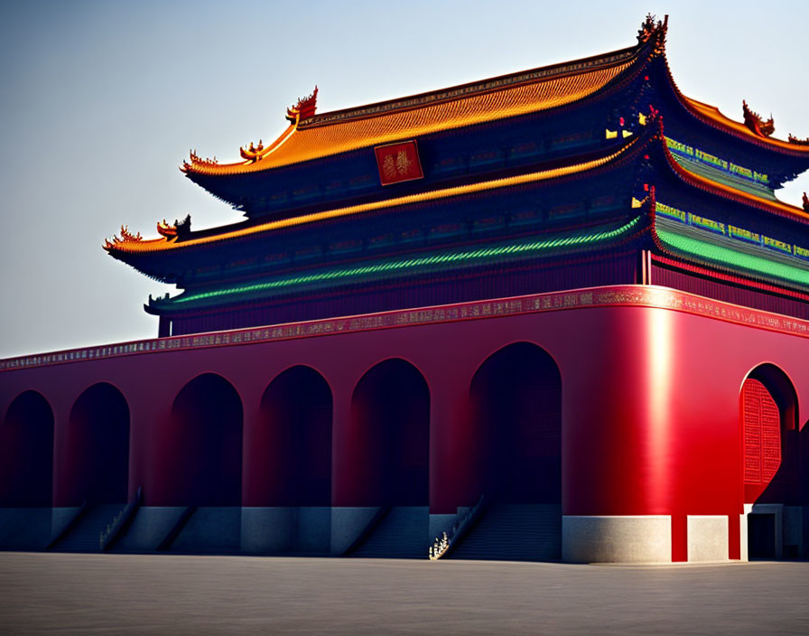 Traditional Asian Building with Red and Blue Ornate Roofs Against Clear Blue Sky