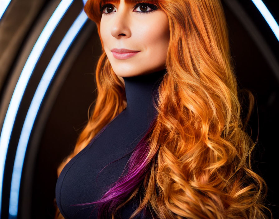 Woman with Long Wavy Reddish Hair Smiling Against Blue Neon Lights