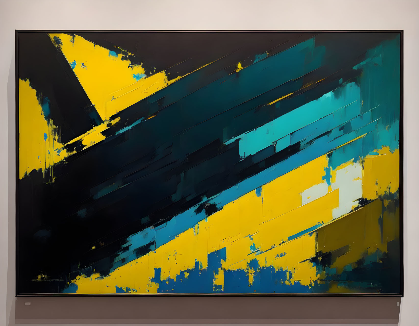 Abstract painting with black, blue, and yellow streaks on white background in gallery display