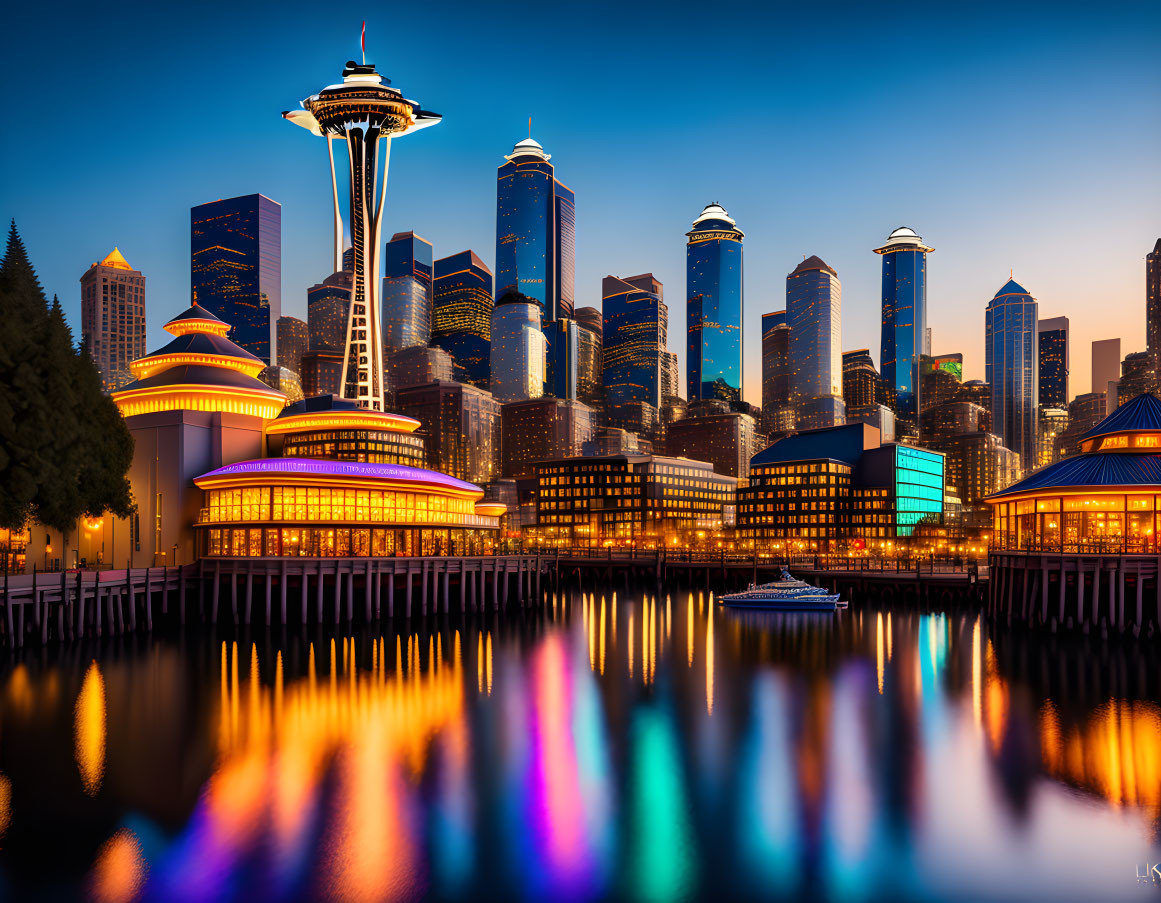 City skyline at twilight with illuminated skyscrapers and Space Needle reflected in water.