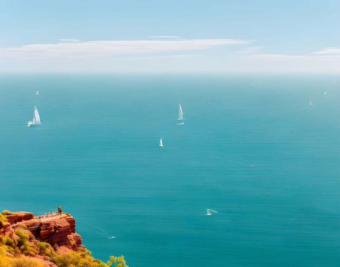 Coastal Sailboats and Cliff-top View of the Sea