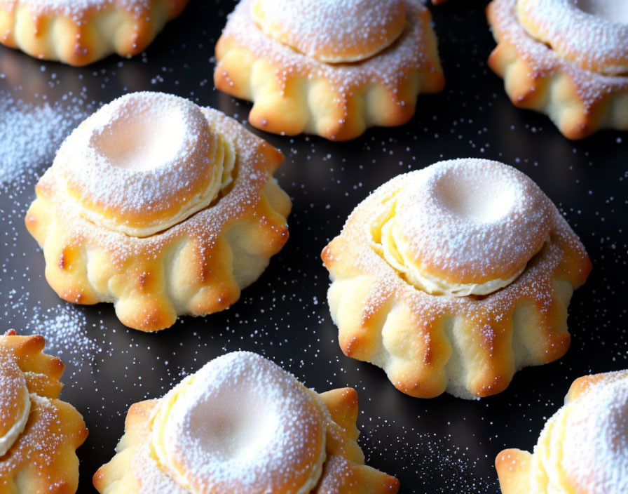 Delicious freshly baked pastries dusted with powdered sugar