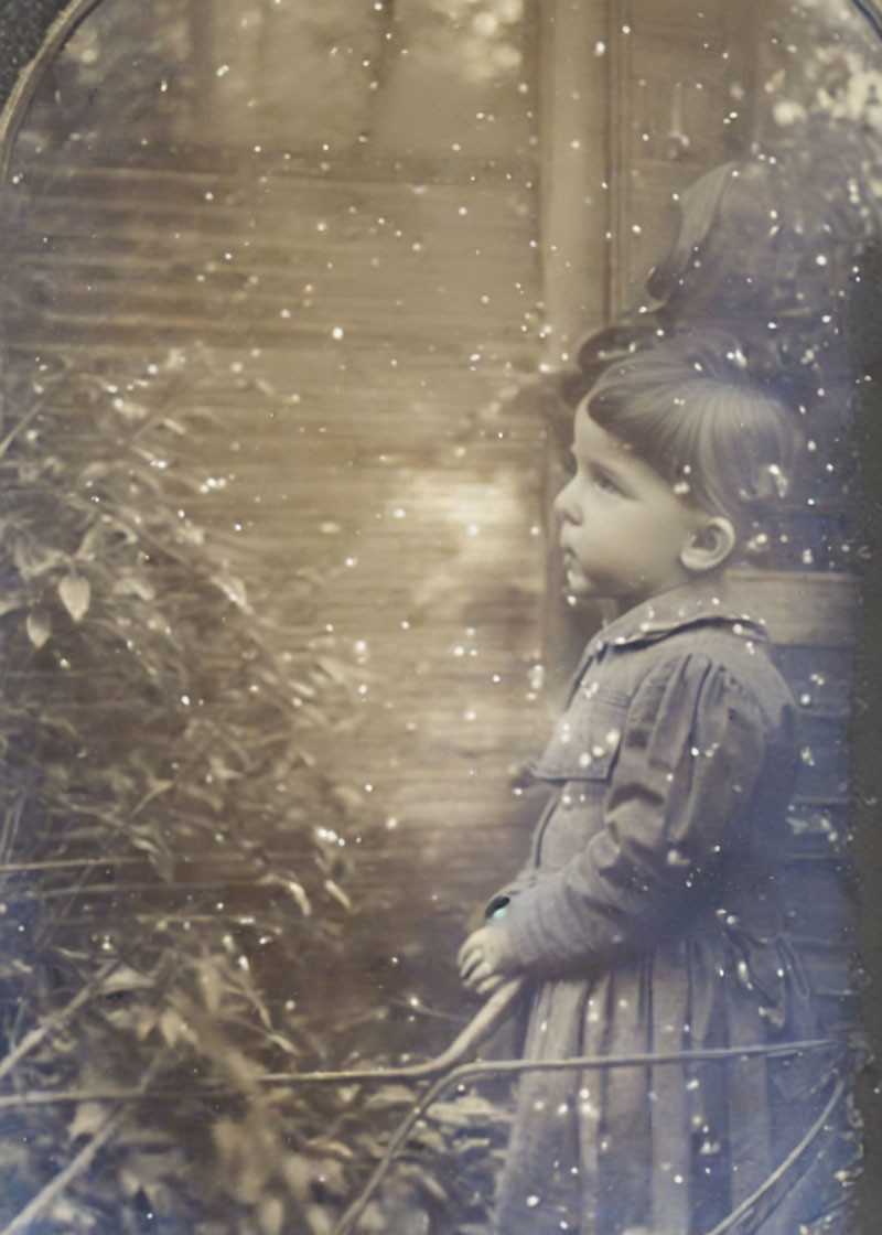 Vintage sepia-toned photo: Young child in period clothing outdoors