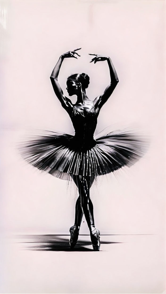 Ballet dancer in tutu on pointe, black and white photo