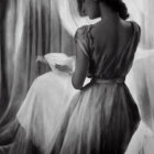 Monochrome image of woman in elegant dress with vintage vibe