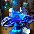 Vintage Blue Goblet with Pocket Watch, Coins, and Purple Fabric on Ornate Table