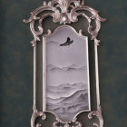 Silver Leaf Design Frame Surrounds Grayscale Mountain and Bird Pattern