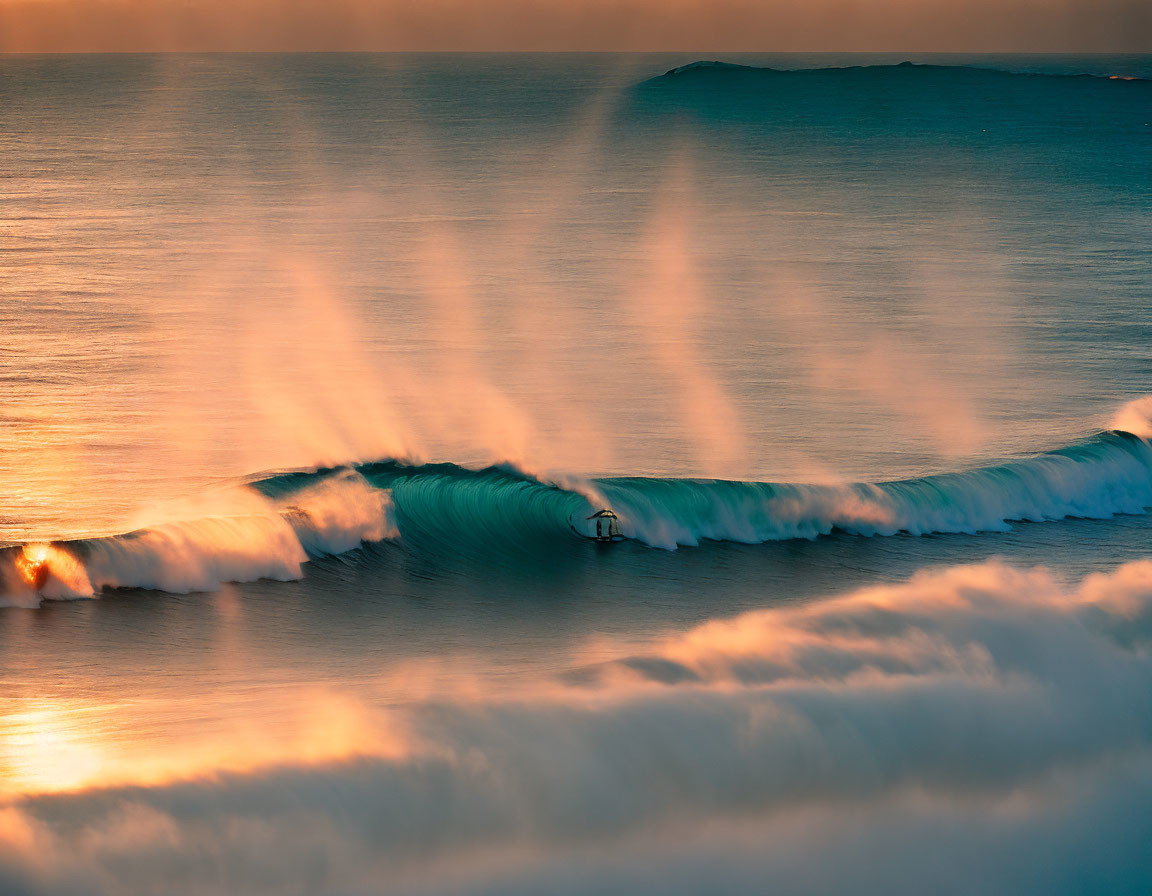 Surfer riding wave at sunset with golden light and long shadows.