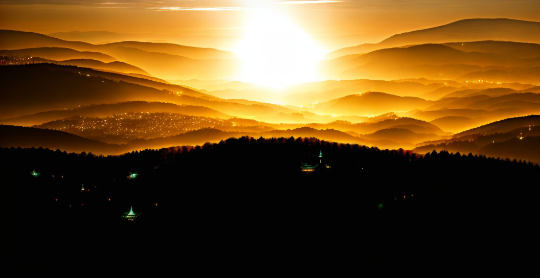 Layered Mountain Ranges at Sunrise with Silhouettes and Golden Light