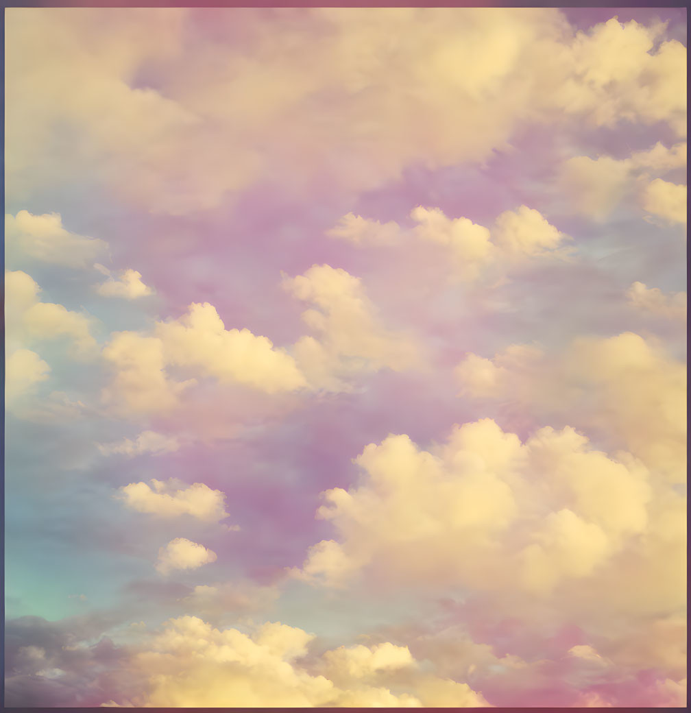 Pastel Pink, Purple, and Gold Sky with Soft Clouds