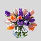 Colorful Purple and Orange Tulip Bouquet in Clear Glass Vase