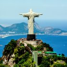 Iconic Christ the Redeemer statue on mountain with soap bubbles for surreal effect